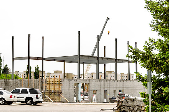 Construction continues on the new Science and Techonology Building. The installation of the iron work provides the neccesary structure for additional floors.