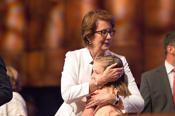 Sister Don R. Clarke with one of her granddaughters at the BYU-Idaho devotional.