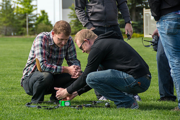 Engineering students test out the hexcopter they made.