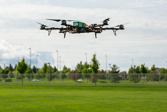 Engineering students test out the hexcopter they made.