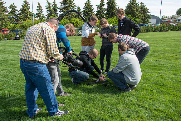 Engineering students test out the hexcopter they made.