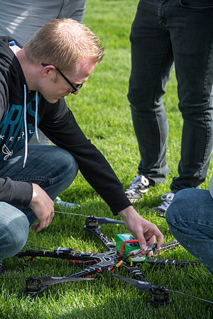 Engineering students test out the hexcopter they made.