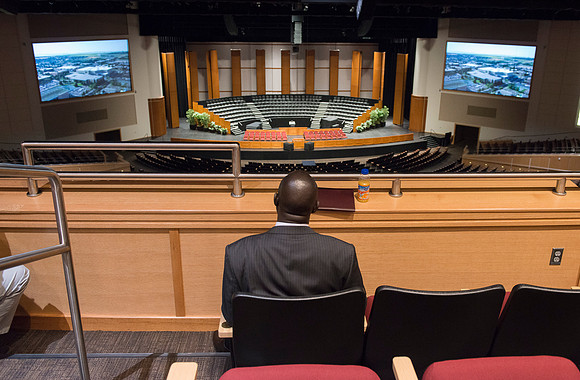 The Ugandan Minister of State for Relief, Disaster Preparedness and Refugees, enjoys a tour of BYU-Idaho, accompainie by David Pigott and Brett Sampson. His son is a student here at the University.