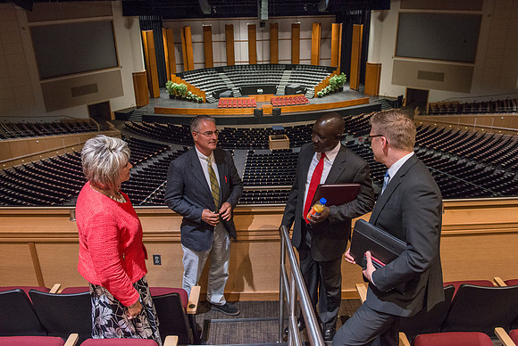The Ugandan Minister of State for Relief, Disaster Preparedness and Refugees, enjoys a tour of BYU-Idaho, accompainie by David Pigott and Brett Sampson. His son is a student here at the University.