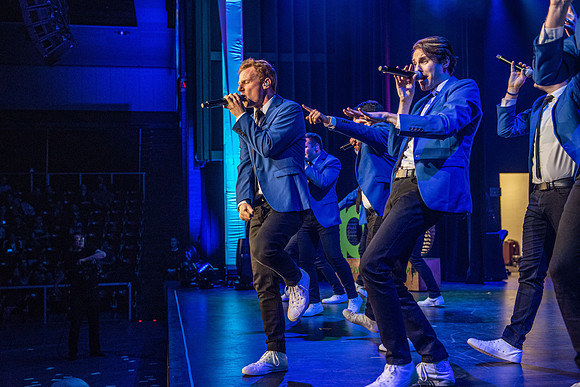 Vocal Point performs during Power to Become, held in the Hart Auditorium.