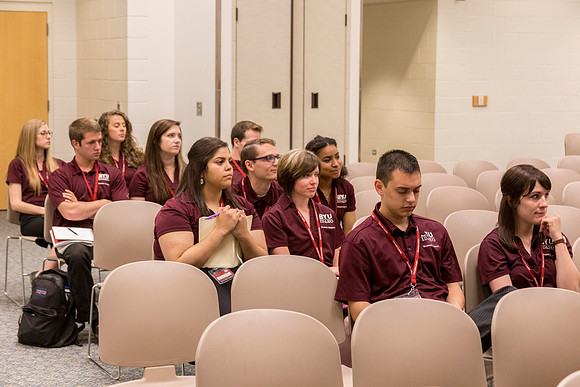 Breakout leaders listen to the talks.