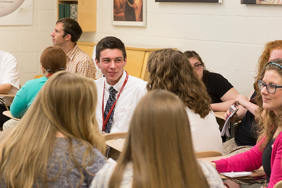 Students discuss what they learned during the first session together during a "breakout".