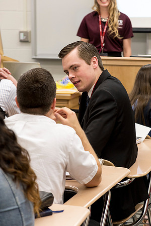 Students discuss what they learned during the first session together during a "breakout".