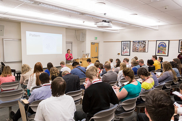 Online Curriculum Development faculty member Rachel Huber leads a workshop.