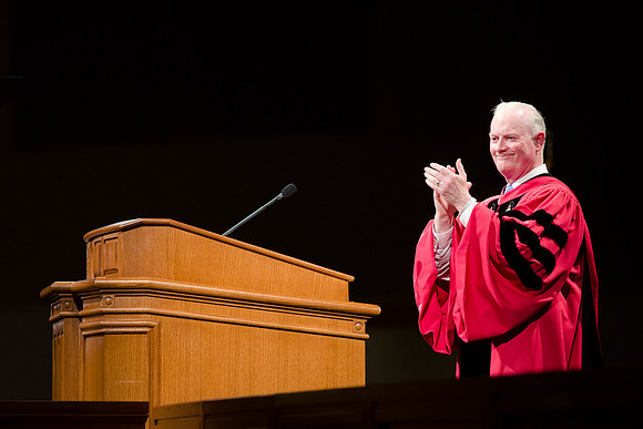 President Kim B. Clark congratulates the 2014 Winter Semester graduates during Commencement in the I-Center. Photo by Tyler Rickenbach