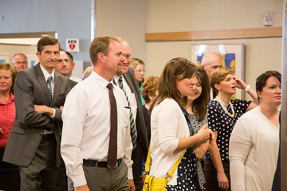 BYU-Idaho Faculty speak together as they wait for the banquet to begin.