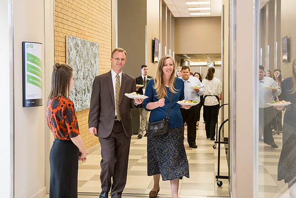 BYU-Idaho Faculty speak together as they wait for the banquet to begin.