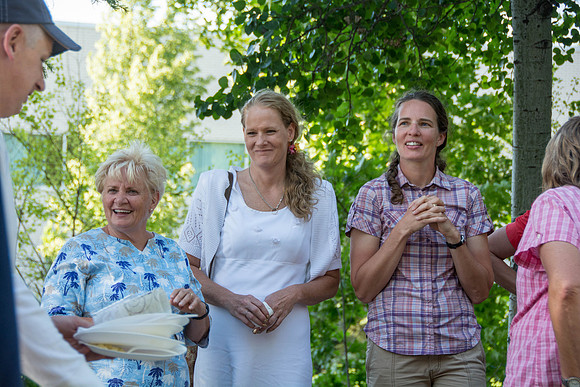 Ricks College Alumni, who competed in basketball, come together for a BBQ dinner with their families.