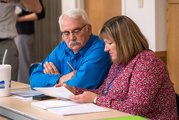 Faculty members come together in preparation of the new school year.