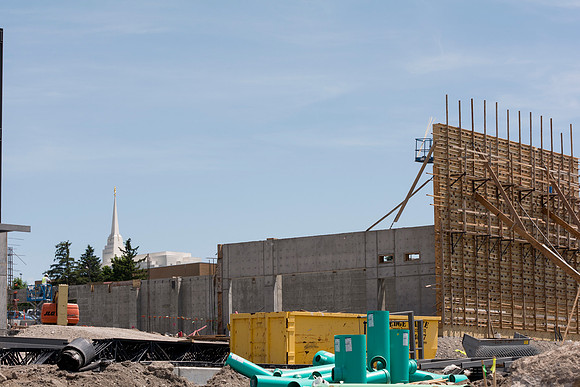Work continues on the new Science and Technology building. Sage St. alongside the Austin Building was blasted to install the utility services.