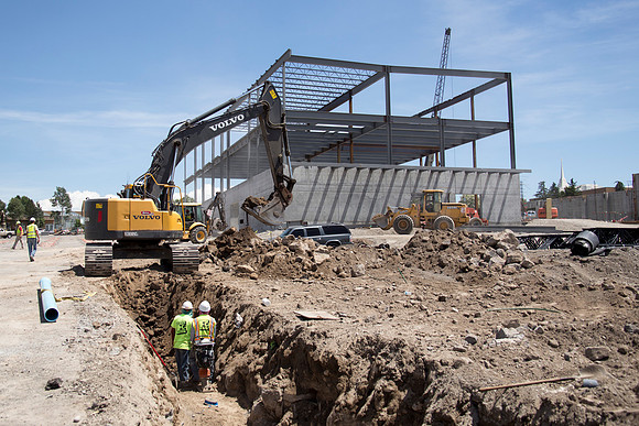 Work continues on the new Science and Technology building. Sage St. alongside the Austin Building was blasted to install the utility services.