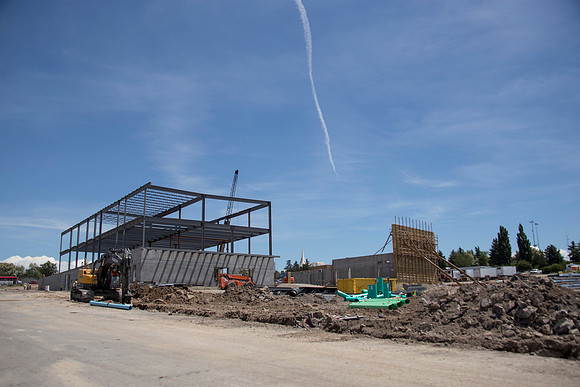 Work continues on the new Science and Technology building. Sage St. alongside the Austin Building was blasted to install the utility services.