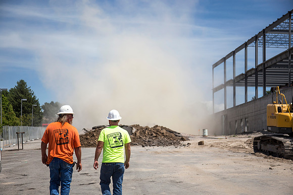Work continues on the new Science and Technology building. Sage St. alongside the Austin Building was blasted to install the utility services.