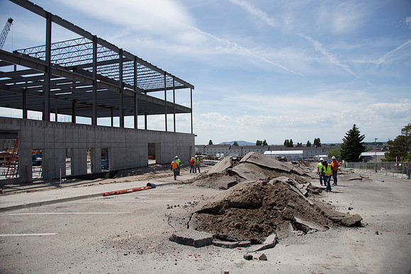 Work continues on the new Science and Technology building. Sage St. alongside the Austin Building was blasted to install the utility services.