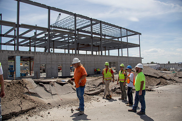 Work continues on the new Science and Technology building. Sage St. alongside the Austin Building was blasted to install the utility services.