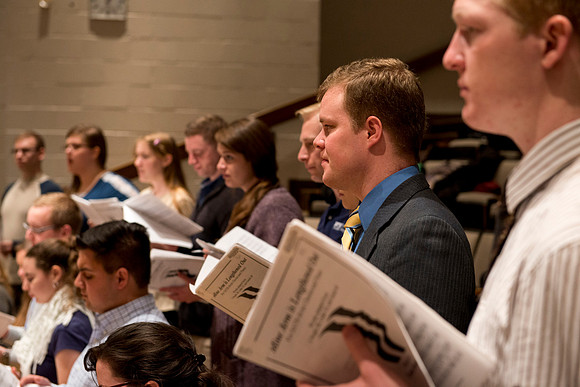Students sing under the direction of Brother Randall Kempton in the Collegiate Singers ensemble.