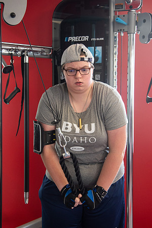 Students work out in the fitness room.