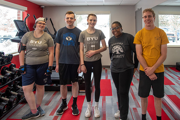 Students work out in the fitness room.