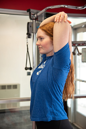 Students work out in the fitness room.