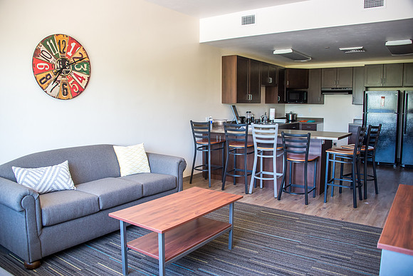 A view of the living room and kitchen in the new Centre Square apartments.