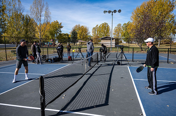 Dinking around playing pickleball for the HR Wellness Video.