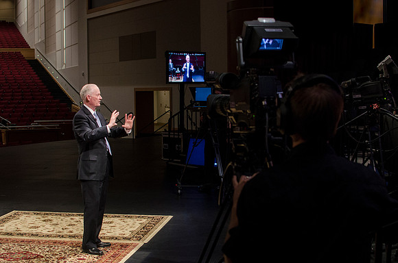 President Kim B. Clark holds a live webinar Q&amp;A on the stage of the I-center, discussing the Pathway program.