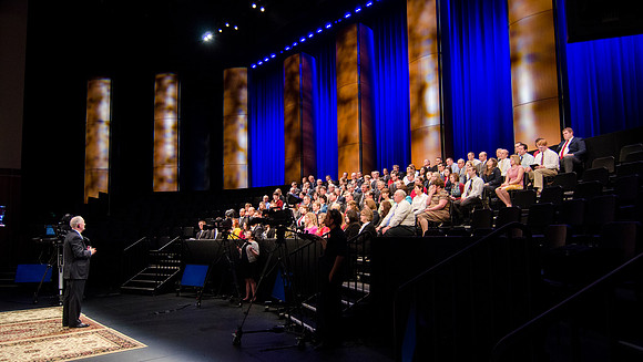 President Kim B. Clark holds a live webinar Q&amp;A on the stage of the I-center, discussing the Pathway program.