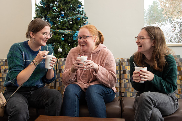 Students at Center Square enjoy some hot chocolate.