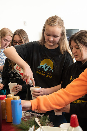 Students at Center Square enjoy some hot chocolate.