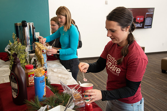 Students at Center Square enjoy some hot chocolate.