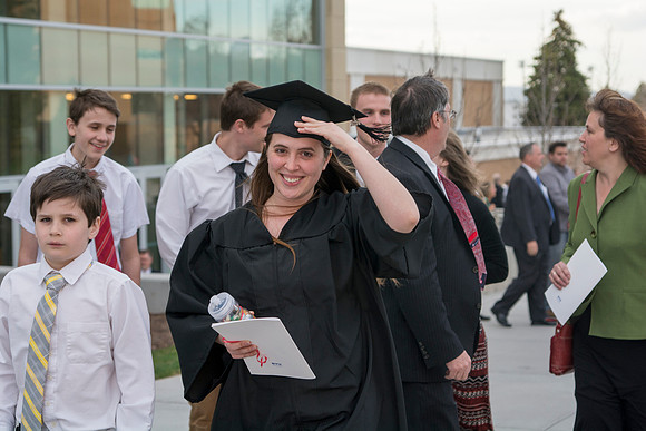 Brigham Young University-Idaho Graduates tour campus with their families saying goobyes to peers and getting pictures with friends and family before the convocation ceremonies. Photo by Ryan Chase