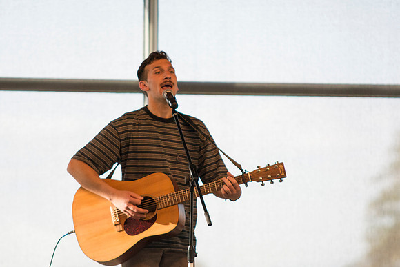 Aaron McCall performs during The Last Voice Standing in the Crossroads, Wednesday night during the 2014 Spring Semester.