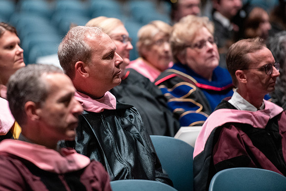Graduates receive their diplomas during Performing and Visual Arts convocation.