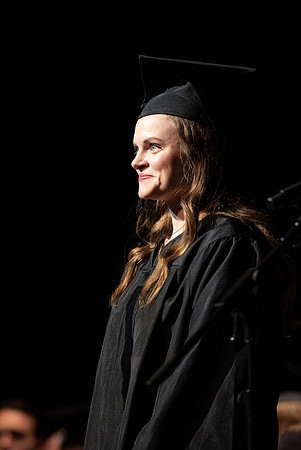 Graduates receive their diplomas during Performing and Visual Arts convocation.