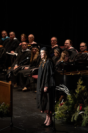 Graduates receive their diplomas during Performing and Visual Arts convocation.