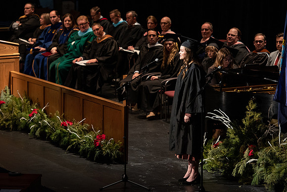 Graduates receive their diplomas during Performing and Visual Arts convocation.