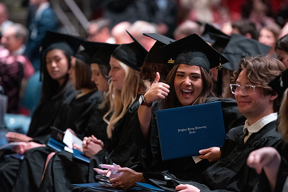 Graduates receive their diplomas during Performing and Visual Arts convocation.