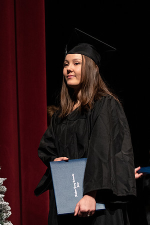 Graduates receive their diplomas during Performing and Visual Arts convocation.