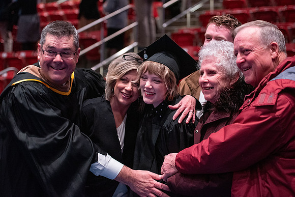 Graduates receive their diplomas during Performing and Visual Arts convocation.