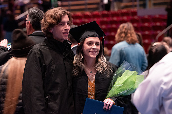 Graduates receive their diplomas during Performing and Visual Arts convocation.