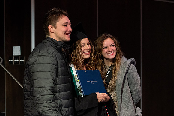 Graduates receive their diplomas during Performing and Visual Arts convocation.