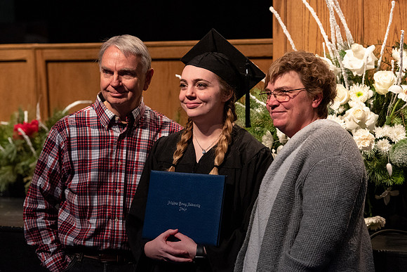 Graduates receive their diplomas during Performing and Visual Arts convocation.