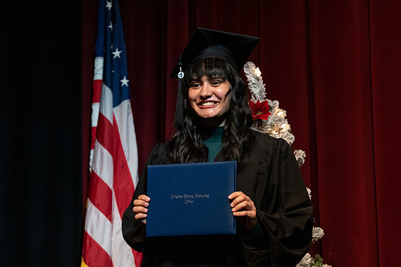 Graduates receive their diplomas during Performing and Visual Arts convocation.