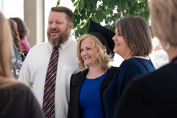 Graduates receive their diplomas during Performing and Visual Arts convocation.