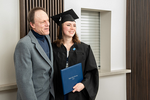Graduates receive their diplomas during Performing and Visual Arts convocation.